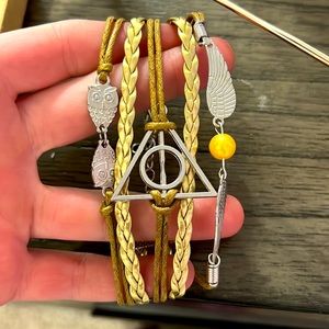 5 layered Harry Potter inspired bracelet. Adjustable clasp.
